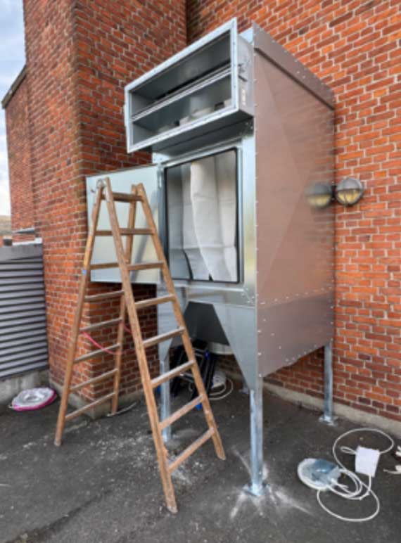 Outdoor dust-filter installation illustrated in HRS’s wood-pellet silo example
